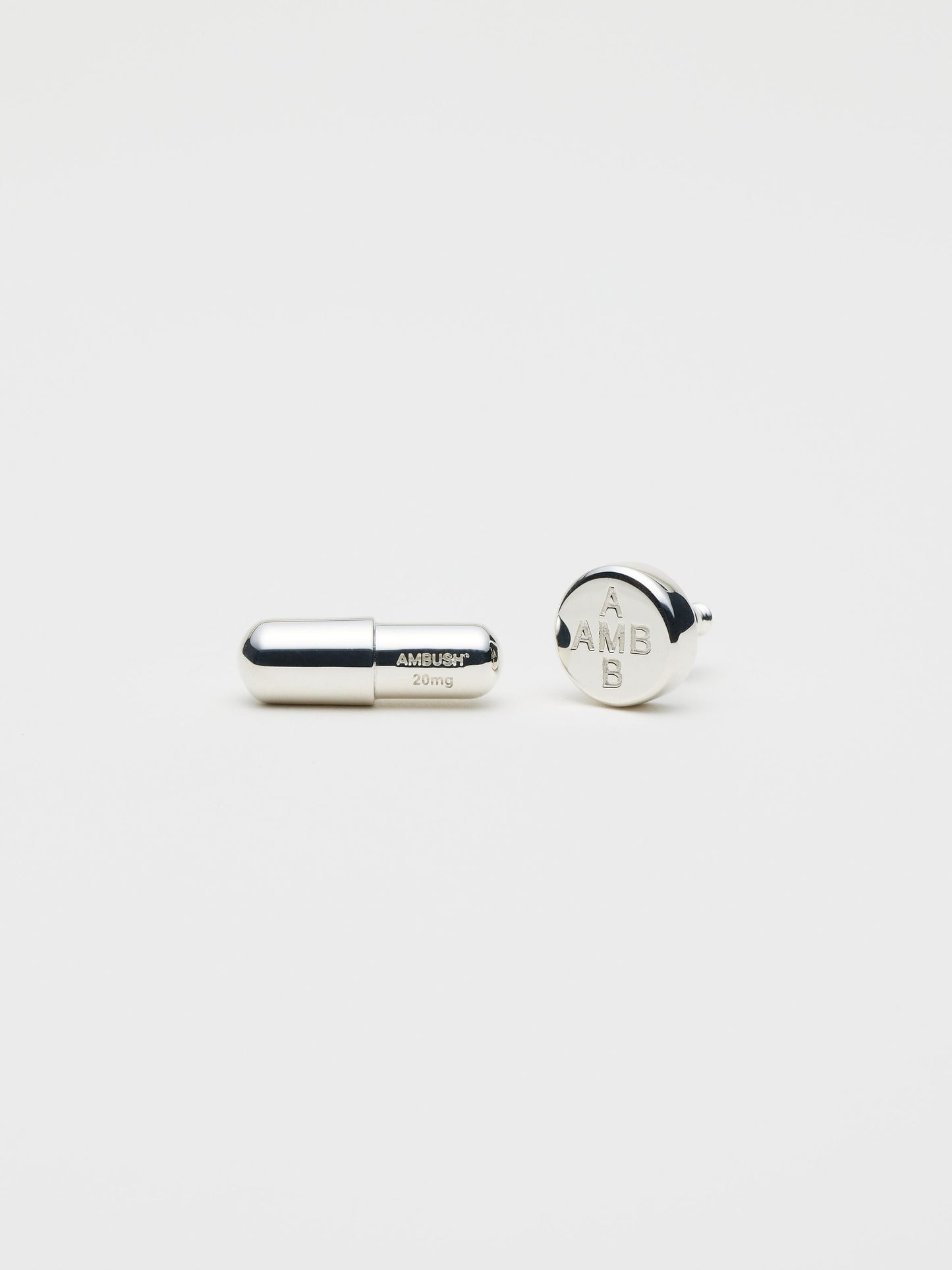 AMBUSH Pill Charm Stud Earrings Silver